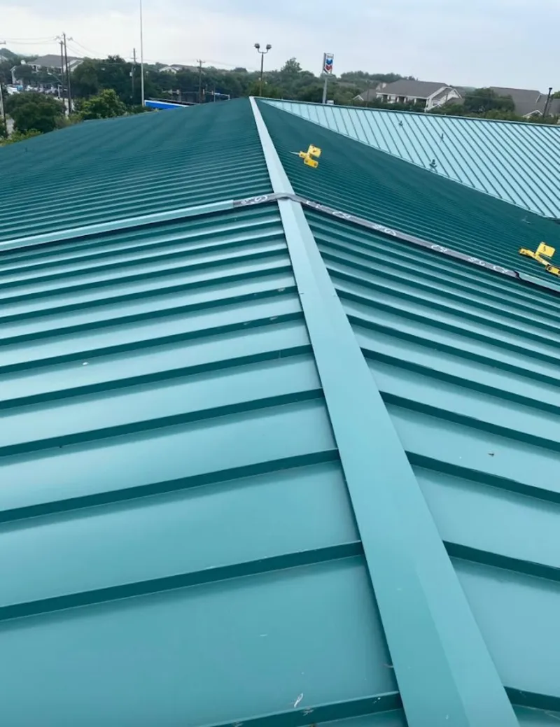 Green commercial metal roof ridge and valley for Metal Roof Repair in Hudson Falls