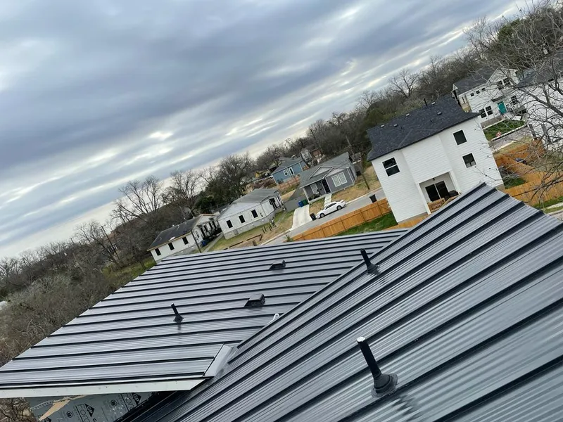 Standing seam metal roof panels with vents for Skylight Repair in Hudson Falls